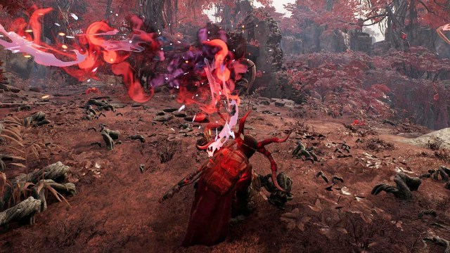 A character rolling to avoid a ranged attack in Yaesha in Remnant 2
