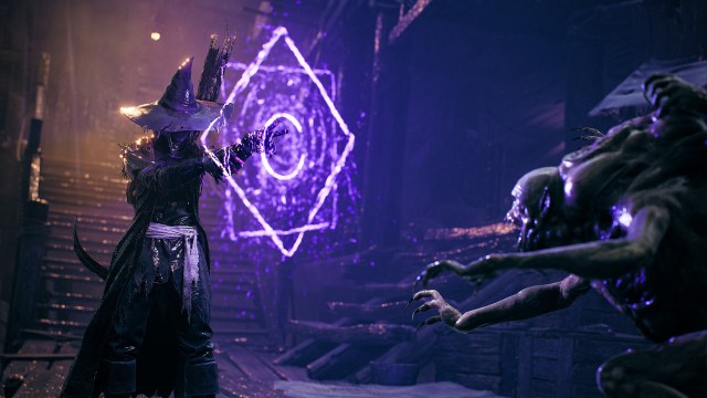 A Ritualist aiming a spell at a monster in Remnant 2.