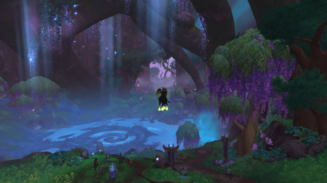 An Evoker riding the Headless Horseman mount in the Emerald Dream in World of Warcraft