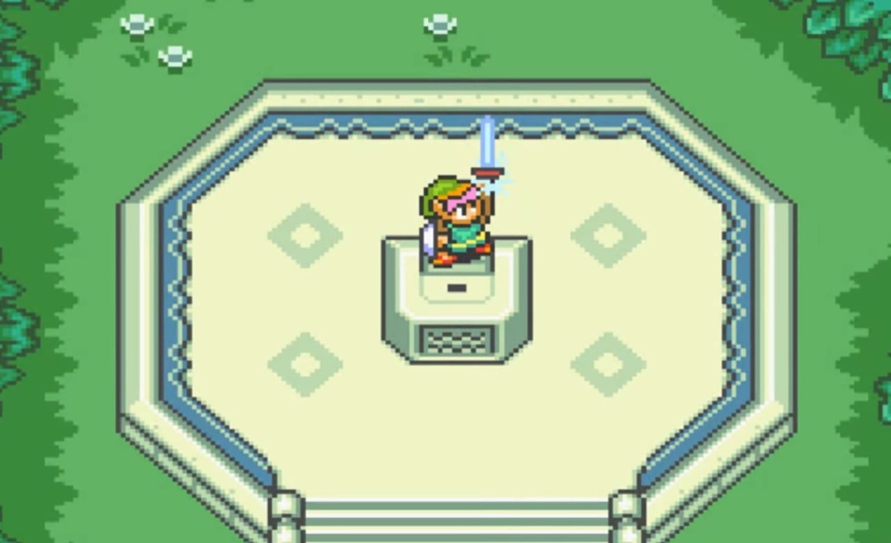 There is a shot of Link pulling the Master Sword from its stone. There is grass and tiles around him on the ground.