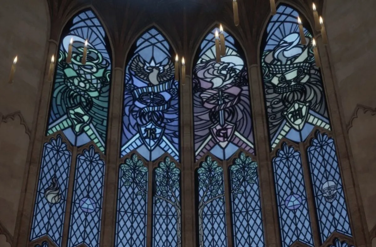 Screenshot of four blue windows in Hogwarts Legacy