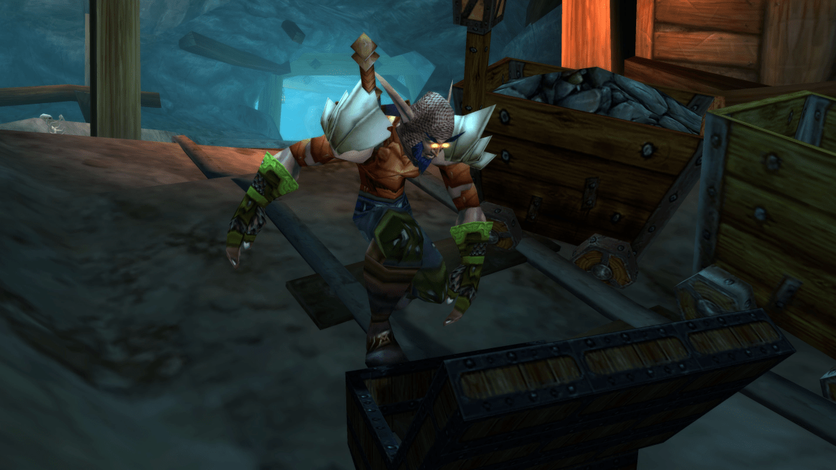 A Night Elf player loots a chest in the WoW Classic season of Discovery