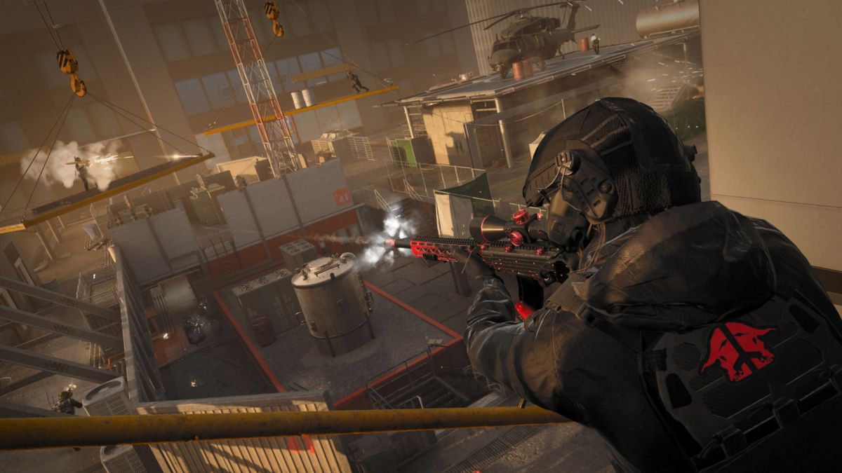 A player standing on a scaffold platform shooting at an enemy on the roof of a building in Modern Warfare 3.