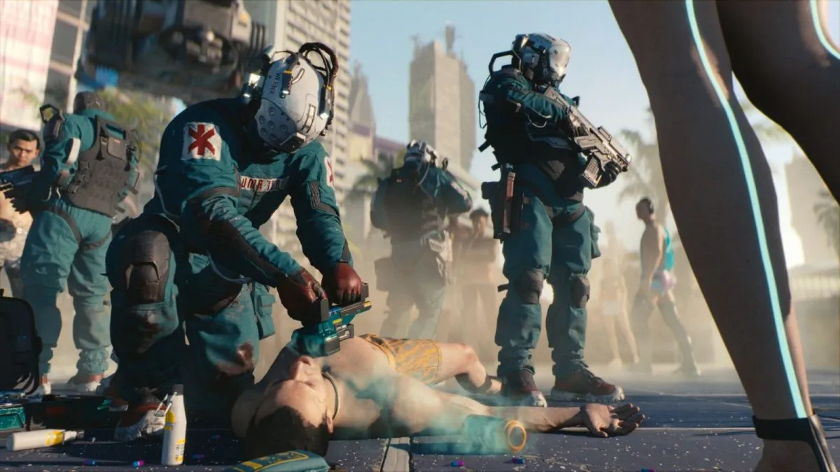 A medic trying to revive a character in Cyberpunk 2077.