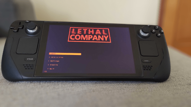 A Steam Deck with Lethal Company's main menu on the screen.