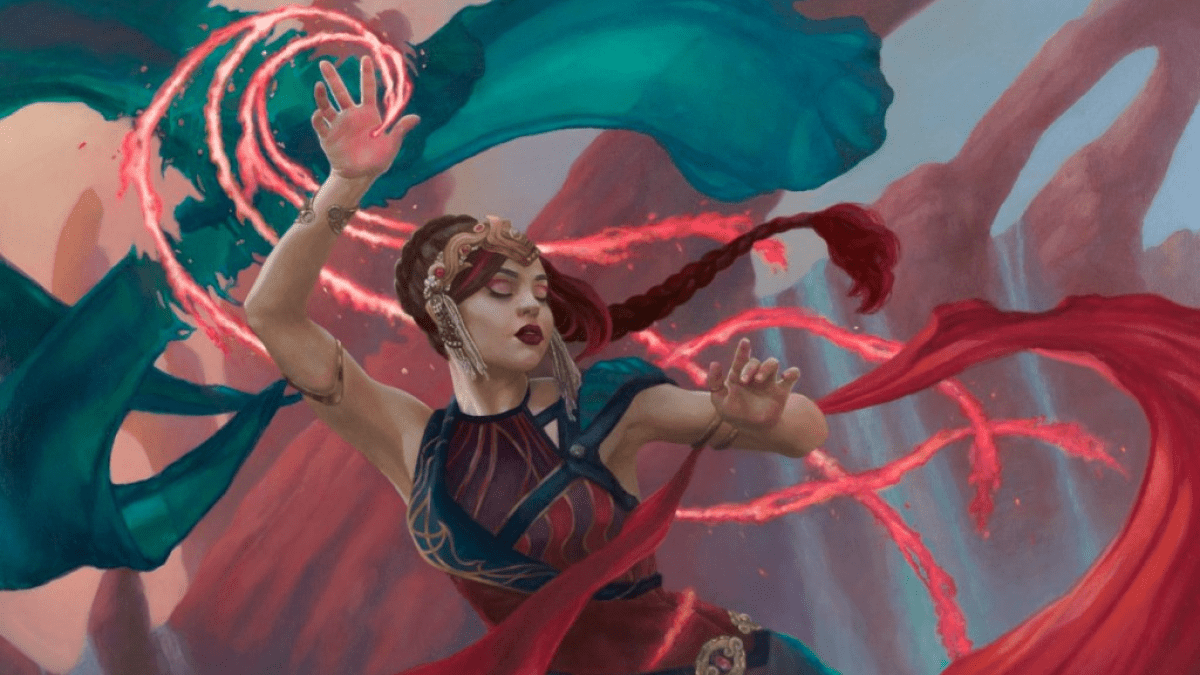 A pale-skinned woman dances with red and blue ribbons in MtG. She's dressed in red clothing as she dances between rock pillars.