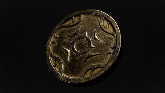 A medallion with golden engravings sits on a black background in Remnant 2.