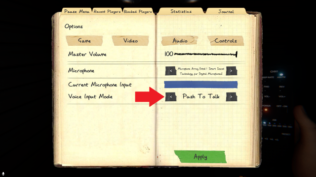 The Phasmophobia journal with the voice input mode marked.