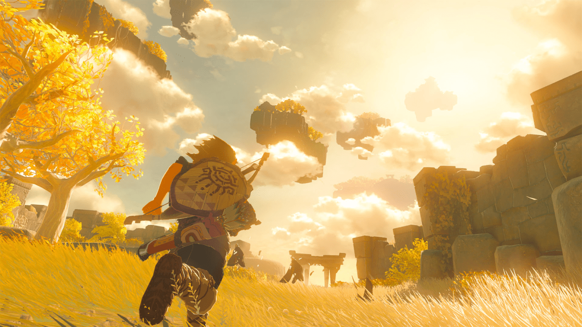 Link running through Hyrule with the sun shining behind the clouds above