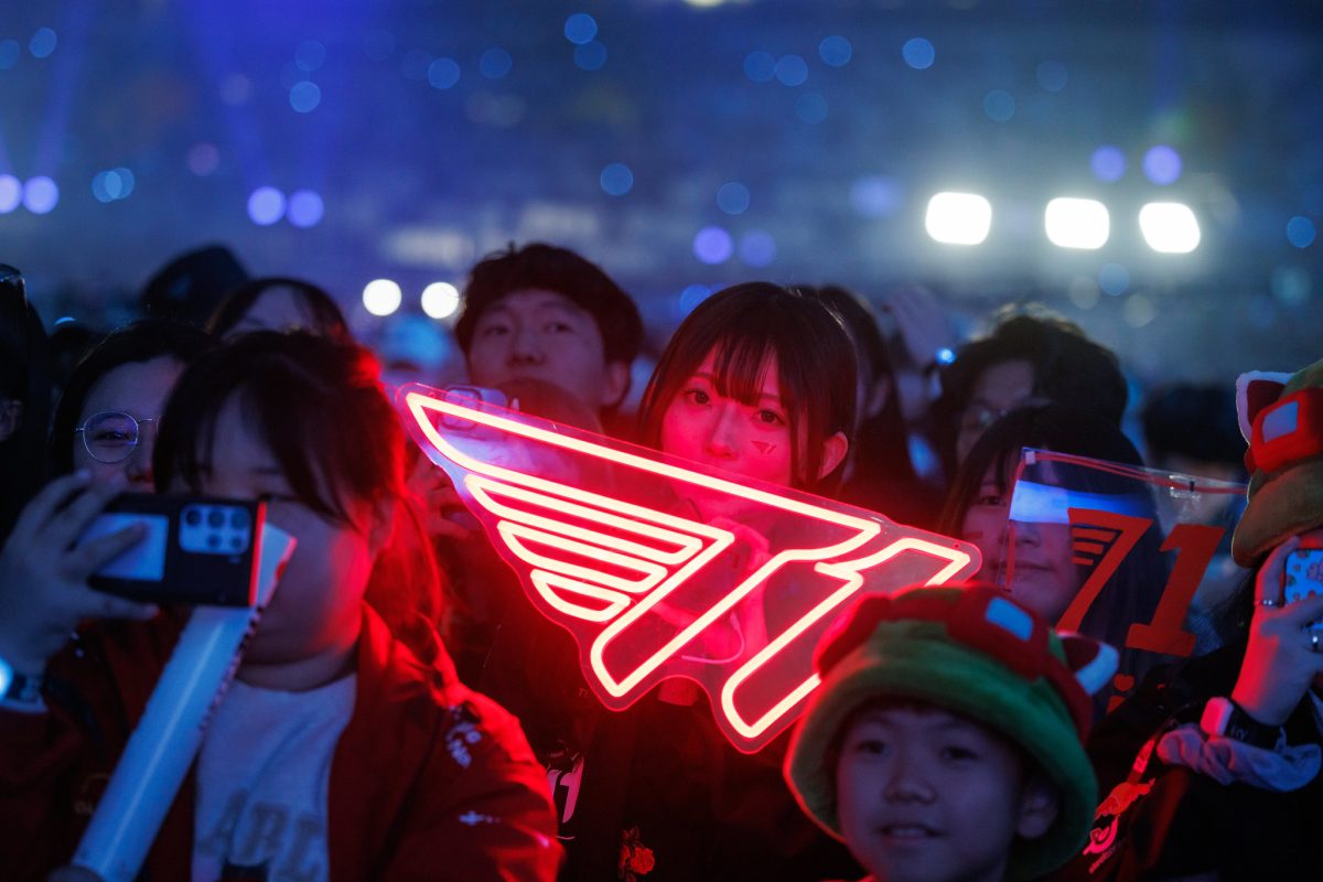 T1 fans holding up signs in support of their team at the 2023 League of Legends (LOL) World Championship (Worlds)