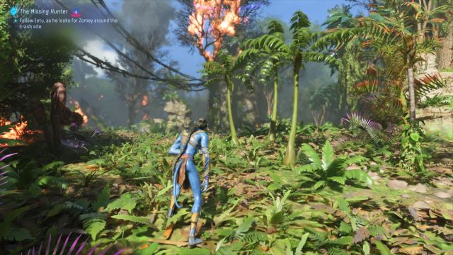 eetu leading the player character through the jungle near a crash site in Avatar: Frontiers of Pandora