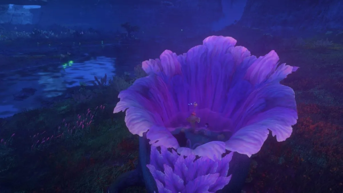 A Na'vi swimming inside of a Tranquility Bulb at night in Avatar: Frontiers of Pandora