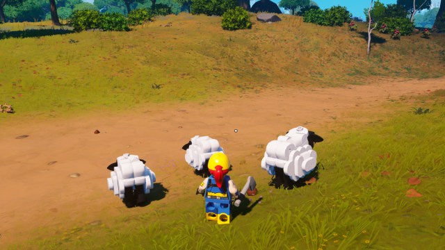 A player in LEGO Fortnite approaching a group of Sheep.