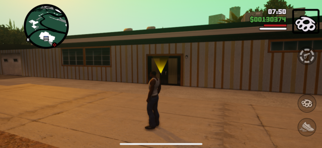 CJ standing in front of a house in San Andreas.
