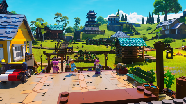 Players work together to build a town in LEGO Fortnite.