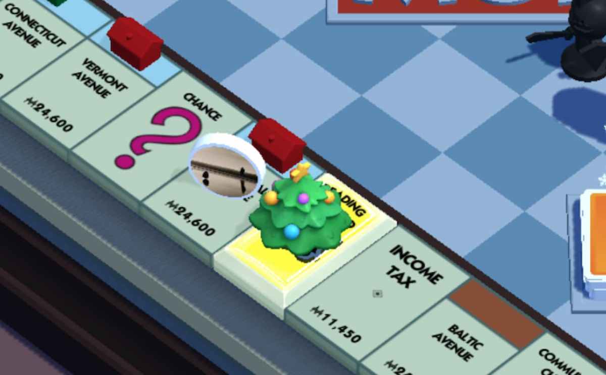 Christmas Tree token on Railroad tile in Monopoly GO!