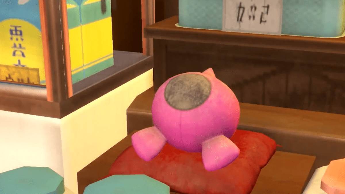 A plush teasing the appearance of Pecharunt.