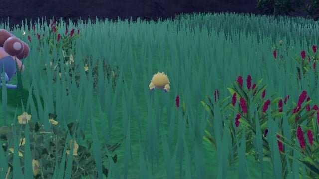 A small, yellow Joltik bounces around in Pokémon Scarlet and Violet.