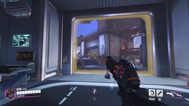 A Cassidy player aims at a practice bot in Overwatch 2.