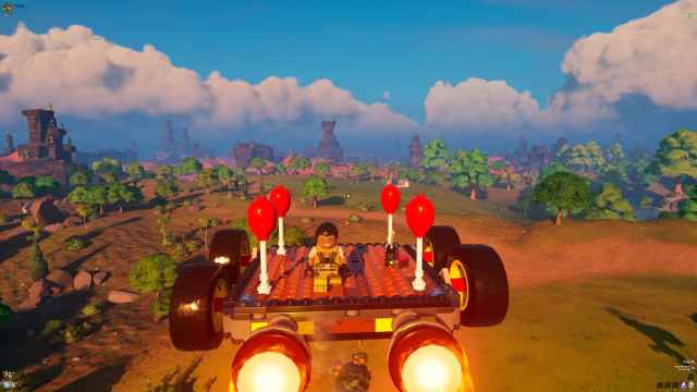 A Lego character is flying in a flying car in Lego Fortnite