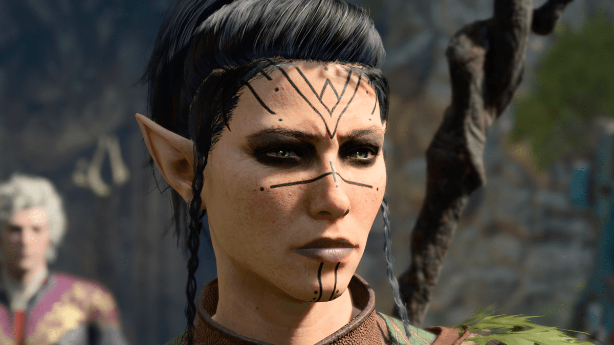 BG3 elf character, with tattoos on her face