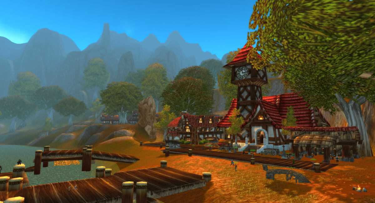 A deep view of Lakeshire in Redridge Mountains, featuring players circulating throughout the human-controlled town in WoW Classic