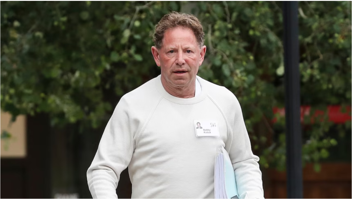 Bobby Kotick, the former CEO of Activision Blizzard, photographed walking outside in a white shirt.