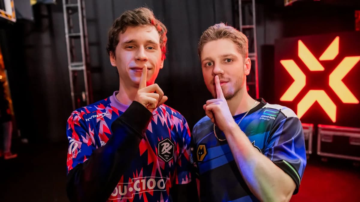 llya "something" Petrov of Paper Rex (L) and Max "Demon1" Mazanov of Evil Geniuses pose backstage at VALORANT Champions 2023.