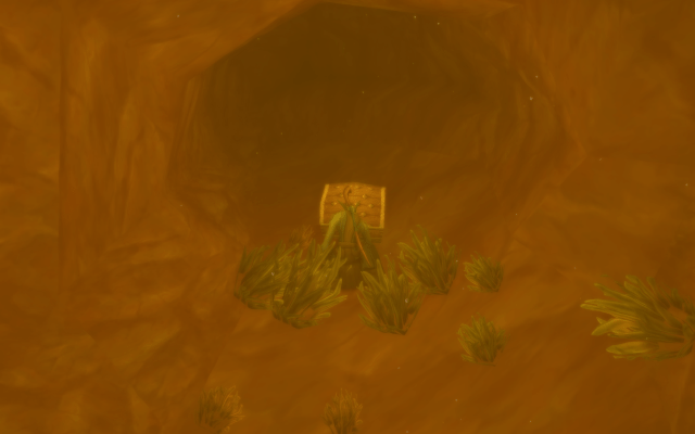 Mage looting an item under water.