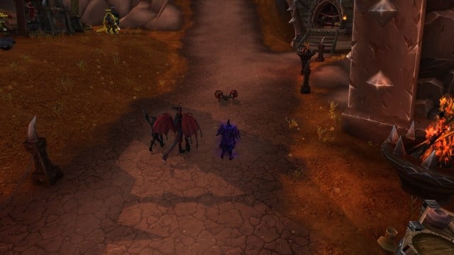 Shadow Priest playing with a racecar in WoW Dragonflight