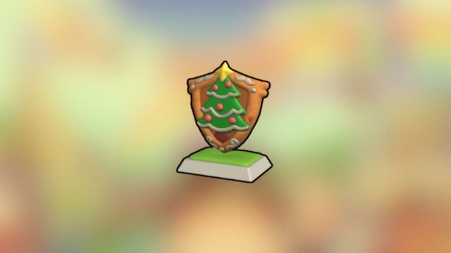 The Merry Spruce shield on a blurry background