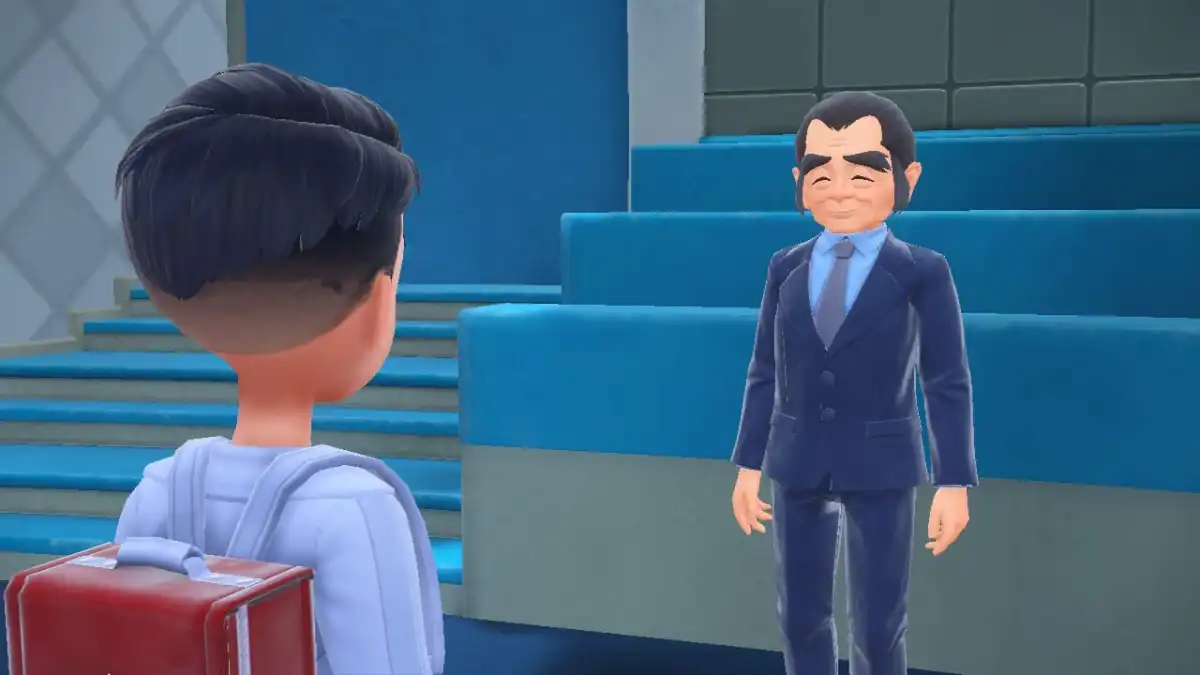 A screenshot of the player character in Pokémon SV The Indigo Disk in front of Snacksworth.
