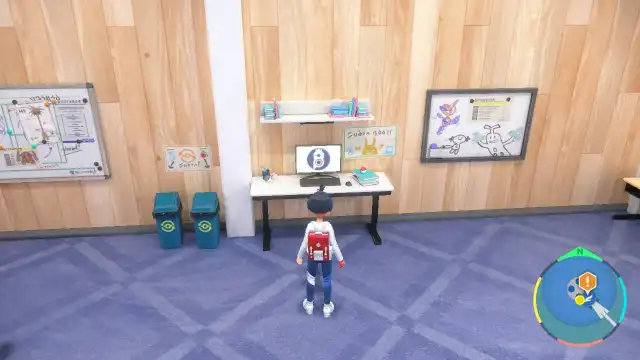 The player character in Pokémon Scarlet and Violet standing in front of the PC in the Pokémon Club.