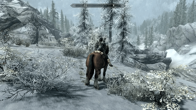 Skyrim player on a horse in the snow