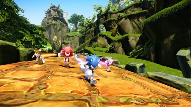 Sonic Boom Tails Knuckles Amy racing down rocky path.