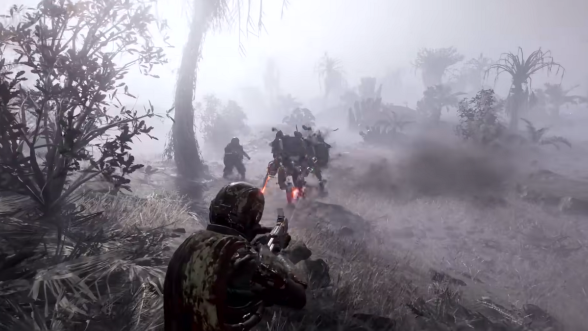 A Helldiver squad explores a foggy zone in Helldivers 2.