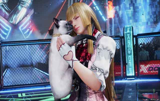 Lili Rochefort hugs her cat to celebrate her victory over her opponent.