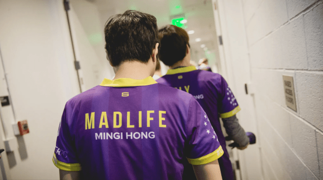 League of Legends player MadLife walking down a corridor