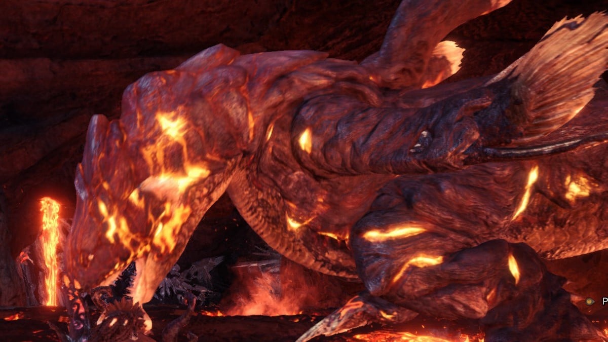The Lavasioth Monster, covered in its magma armor, sits in the Elder's Recess of MHW.
