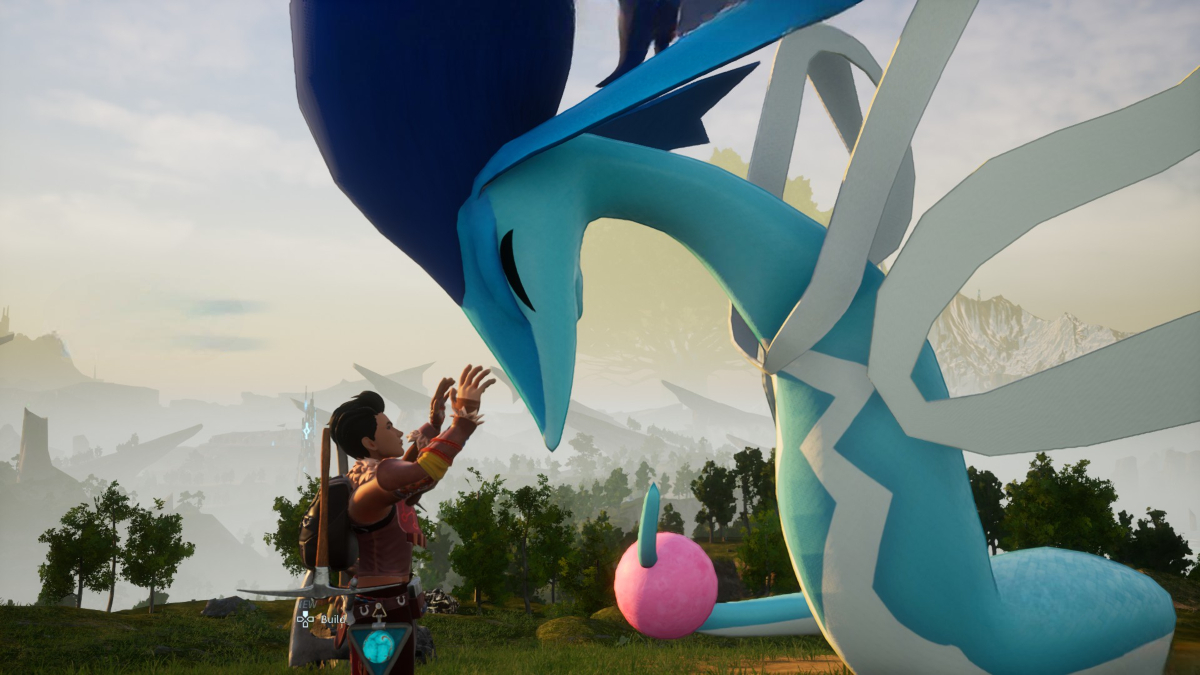 A player in Palworld petting an Alpha Azurobe.
