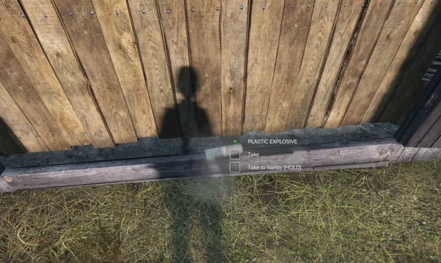 A player looking at a Plastic Explosive in DayZ.