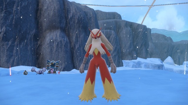 Blaziken standing in the Polar Biome in Pokémon Scarlet and Violet The Indigo Disk