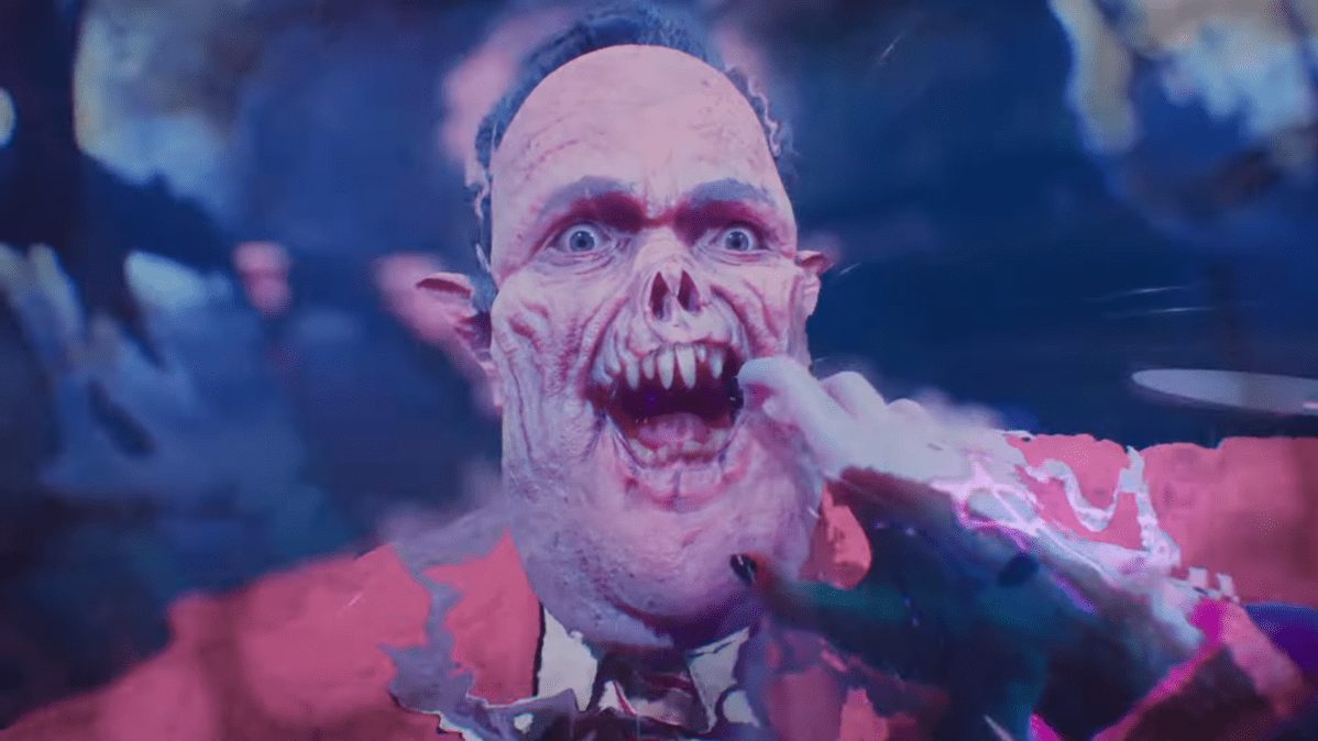 Willem, a vampire with a fat face and jagged teeth, screams and distorts the picture.