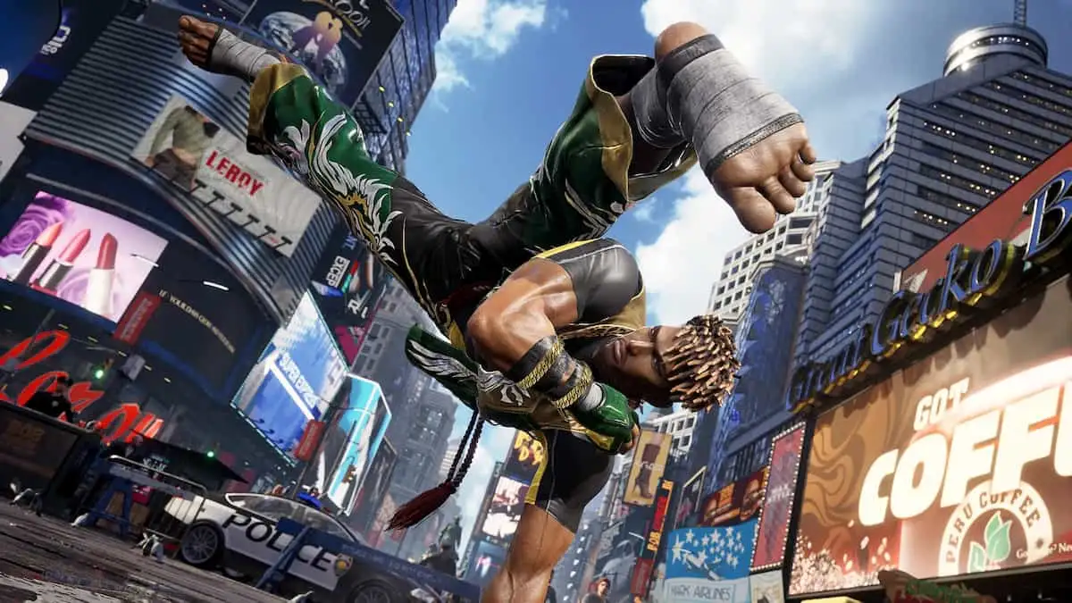 Eddy Gordo performing a kick with his hands planted on the ground.