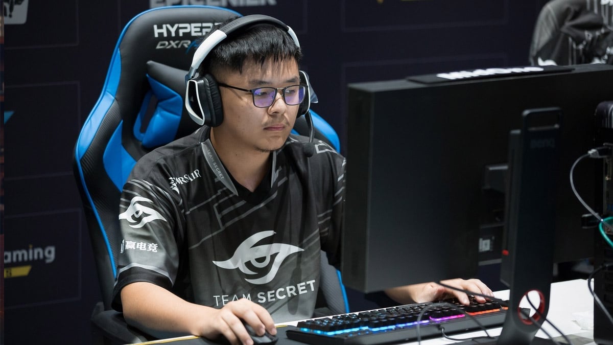 MidOne, a Dota 2 player, sits at a desk while playing for Team Secret.