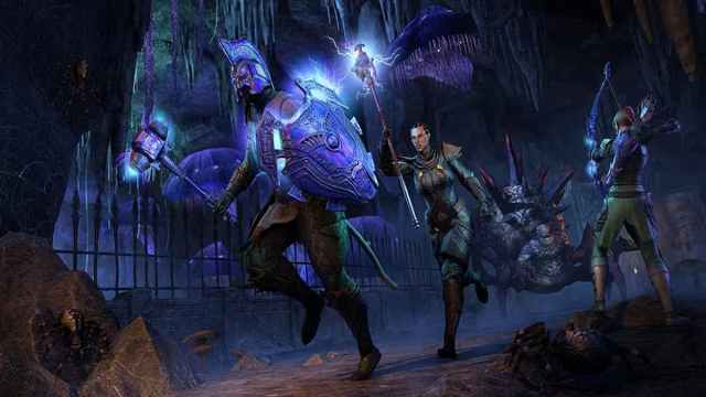 Three ESO characters ruinning in a dungeon.