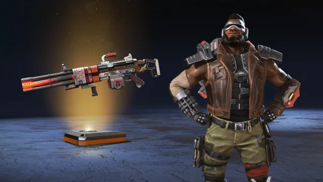 Newcastle skin with goggles, a brown leather vest, black shoulder pauldrons, gloves, and green pants, with matching Spitfire skin next to him.