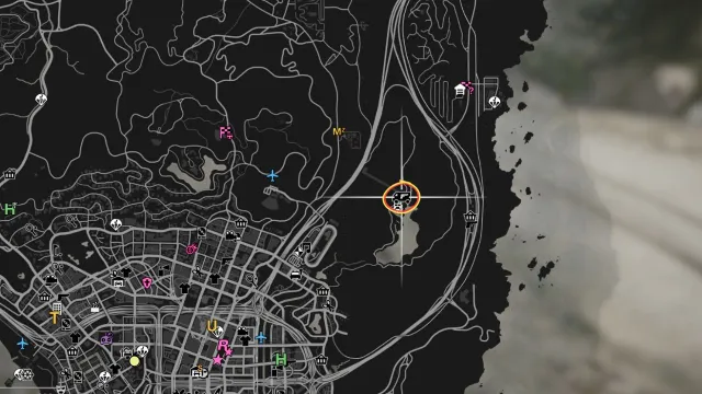 A screenshot from GTA 5's in-game map displaying the location of the Gun Van, marked by a red circle with a gun van icon on the western side of the map in the North Chumash area.