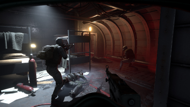 Screenshot of players holding a door with weapons in Marauders.