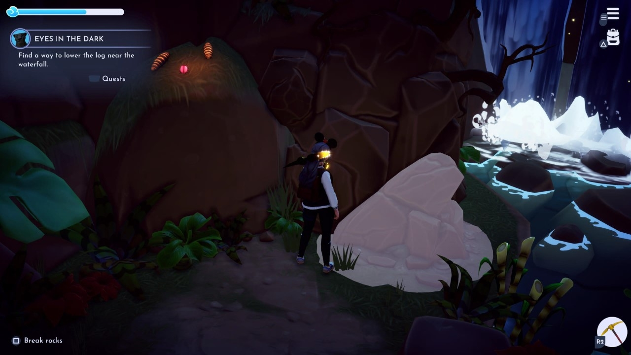 Woman near rock pile in the lion king realm in disney dreamlight valley